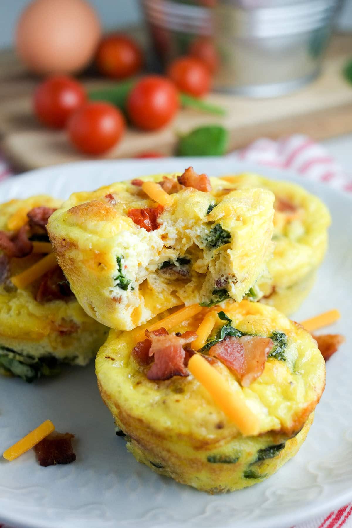 blt inspired egg muffin cups on a white plate