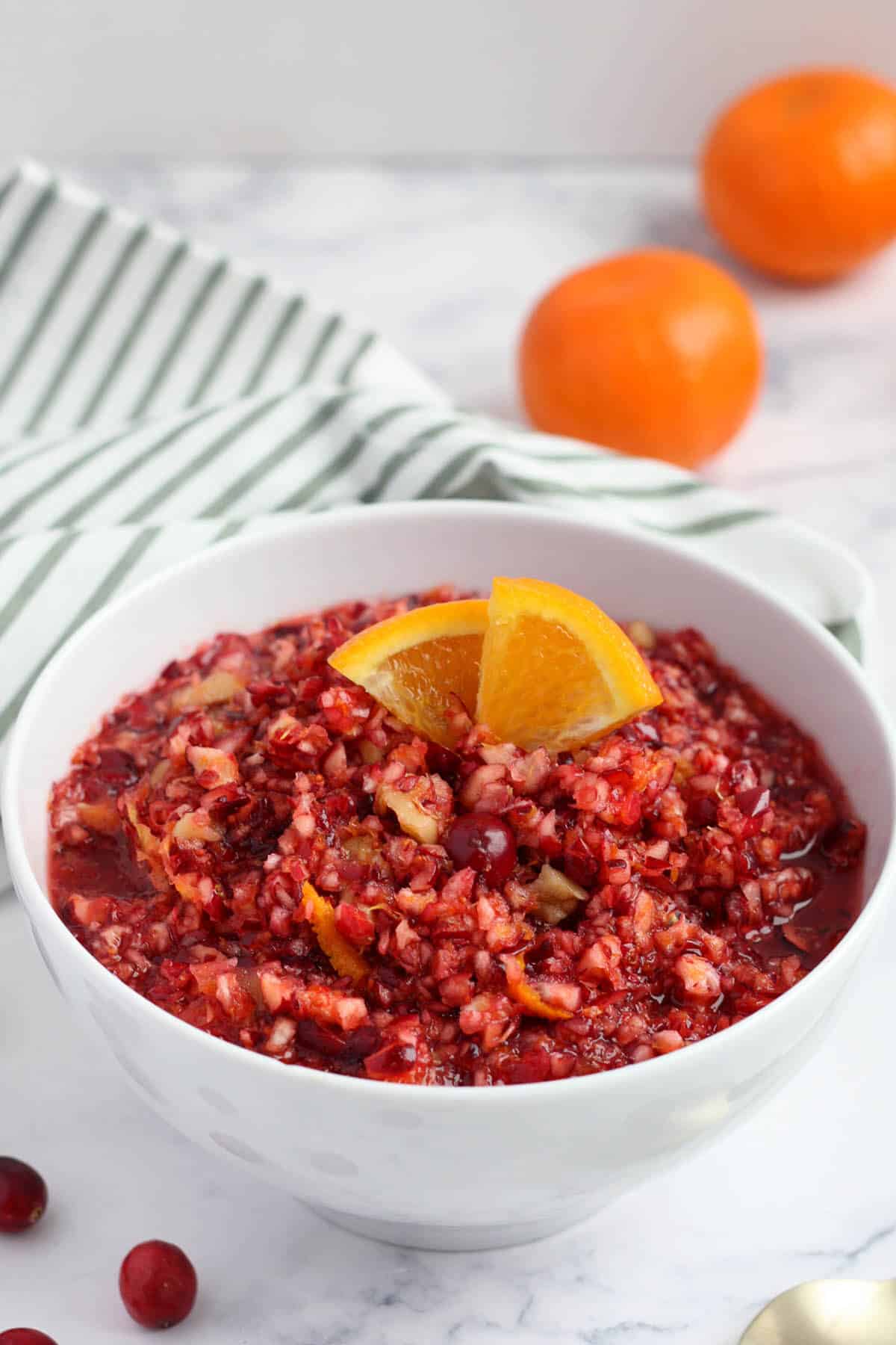 cranberry orange relish in a white serving bowl