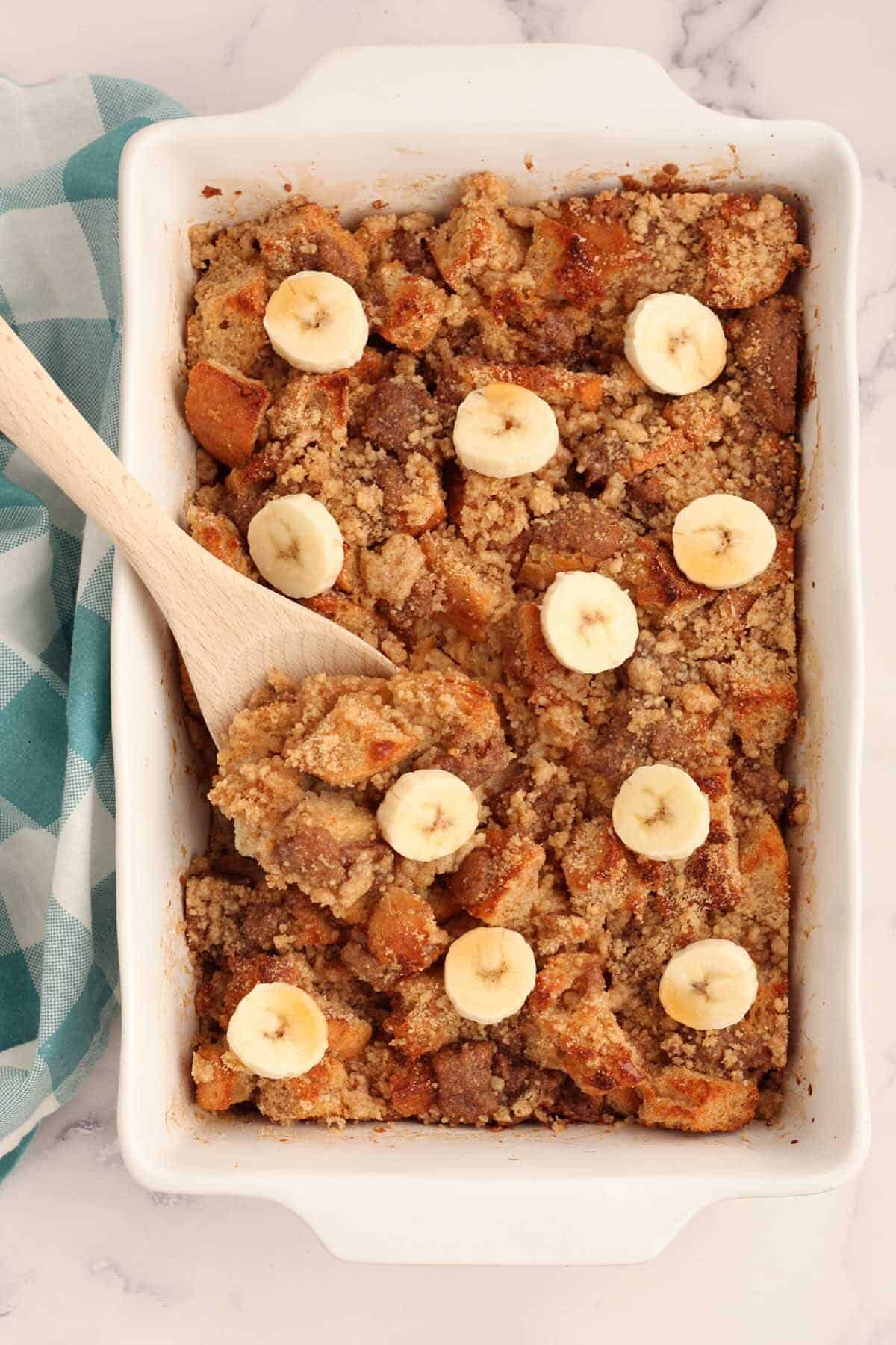 baked french toast casserole in a white baking dish