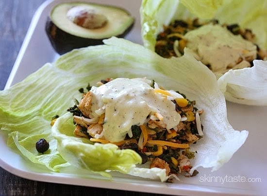 These Santa Fe turkey lettuce wraps are SO good, you'll WANT to save some leftover turkey just to make them (or leftover chicken breast would work too)! Have you ever had the Spinach Santa Fe Egg Rolls with the Cilantro Ranch Dipping Sauce from Chili's? They're dangerously good – I don't even want to know how many calories they are. That's where the inspiration for these lighter lettuce wraps came from.