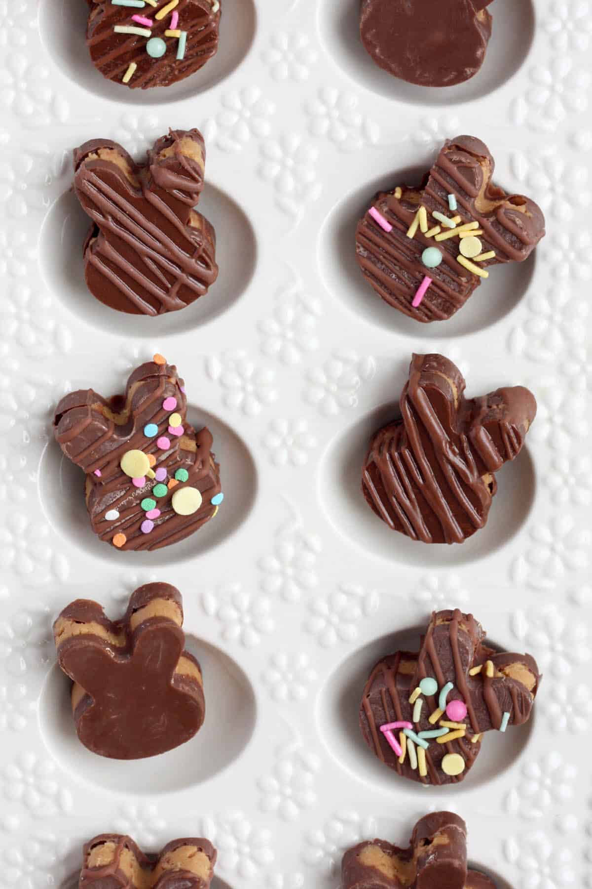 peanut butter cup bunnies in a white egg tray