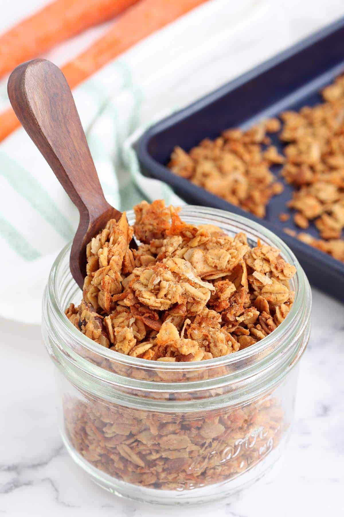 a glass jar filled with homemade granola