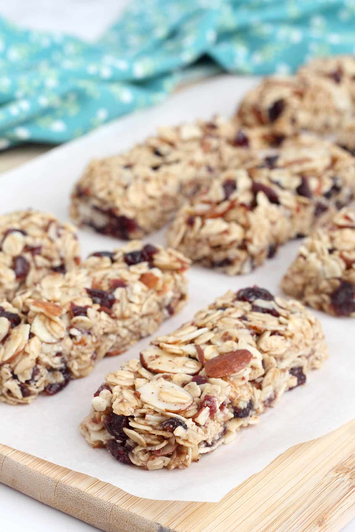 chewy oatmeal bars on a wooden cutting board