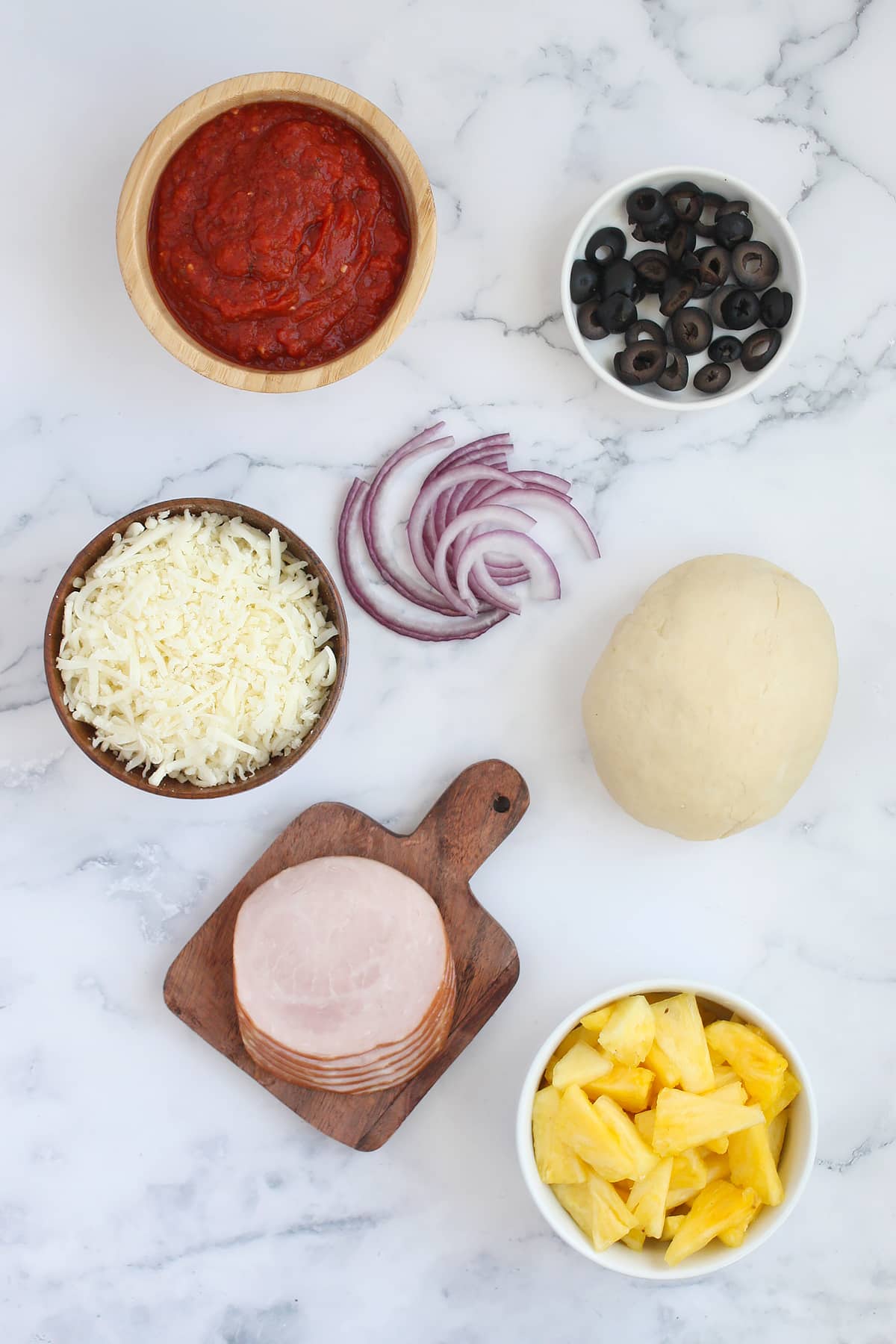 Ingredients you need for Hawaiian pizza.
