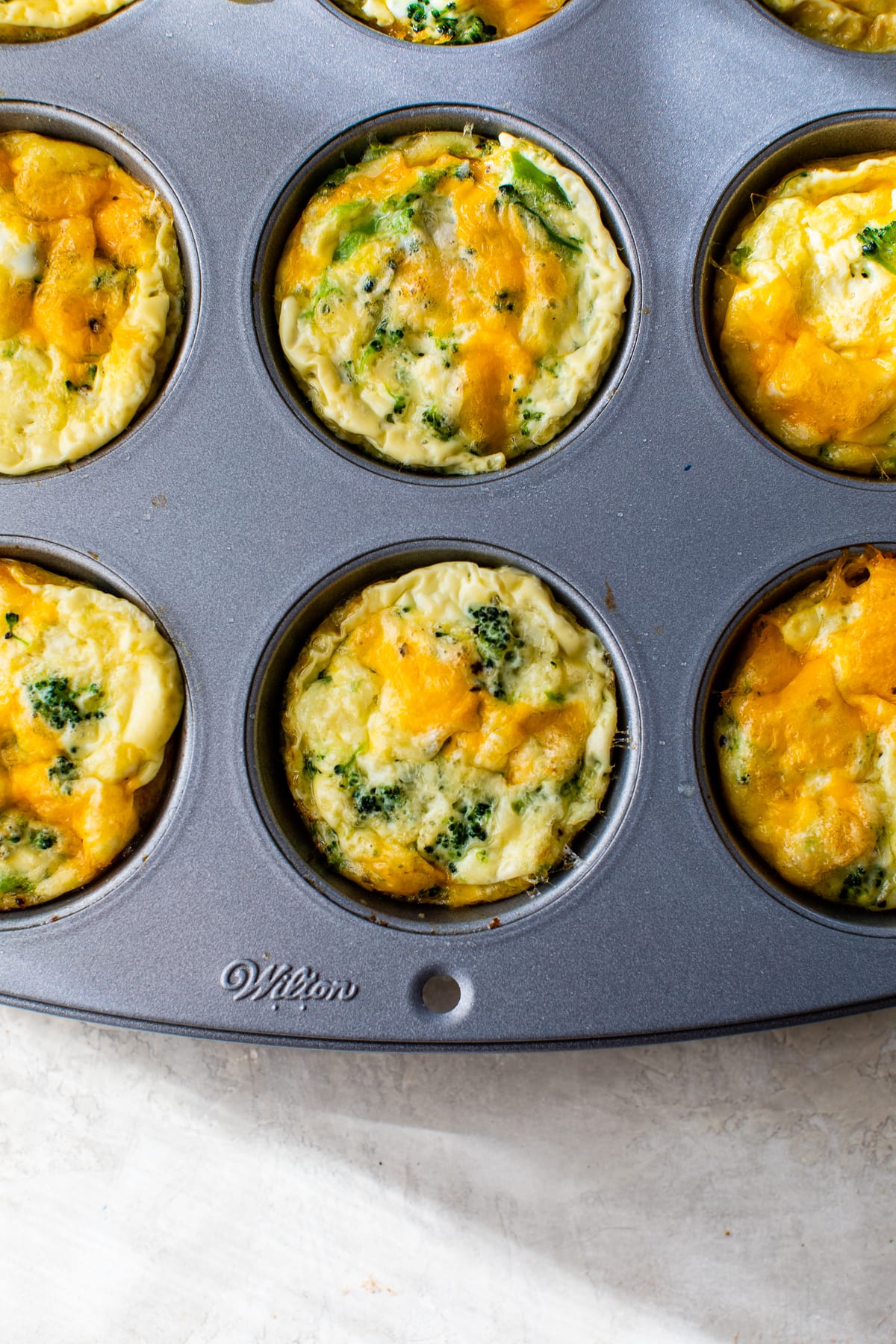 Broccoli and Cheese Eggs in Muffin Tin