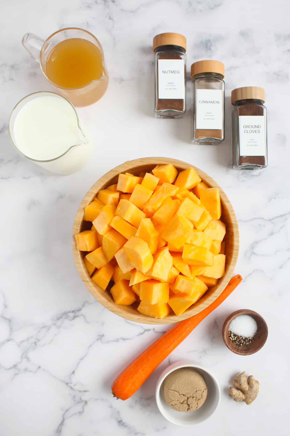 Ingredients needed to make creamy butternut squash soup.